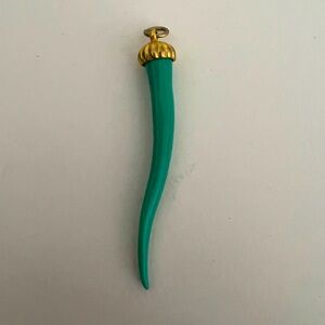 Elegant Green Horn and Gold Pendant.